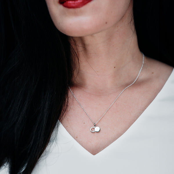 Liz Tabish close up wearing Empty Tomb Small Pendant Necklace