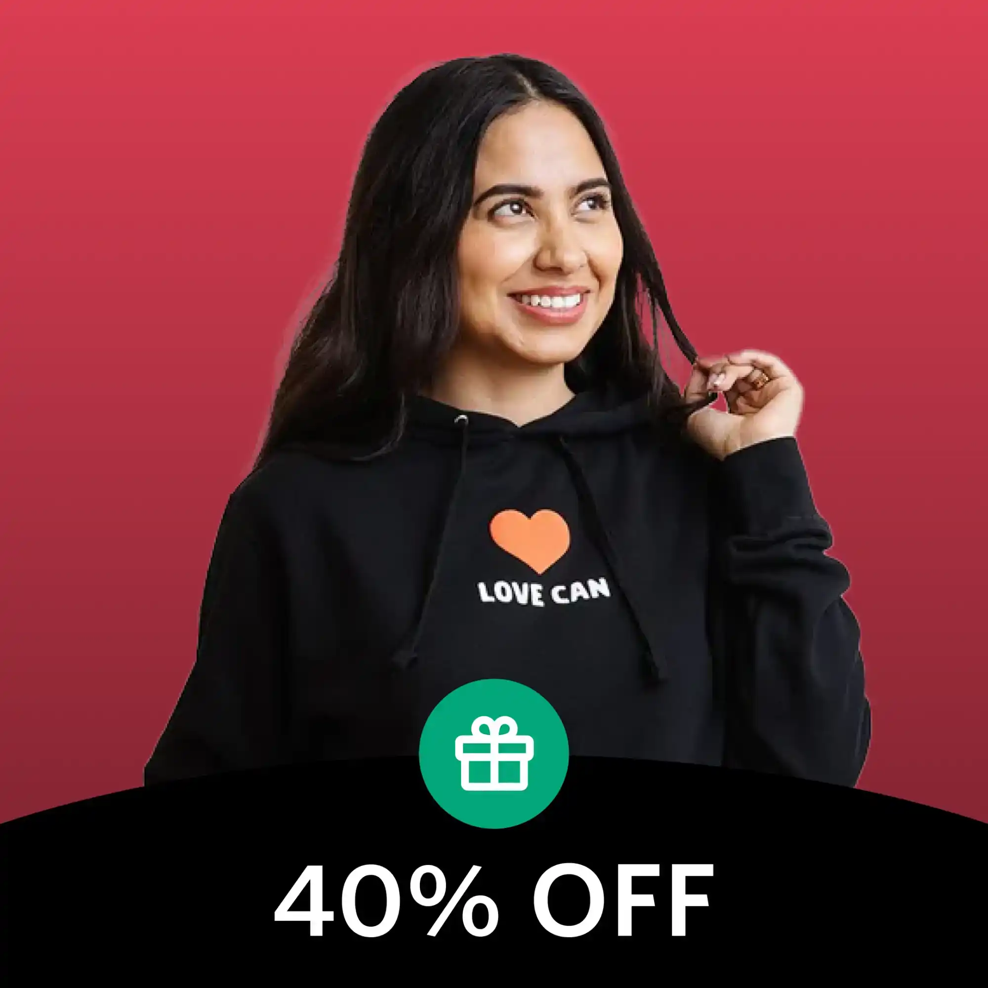 Black hoodie sweatshirt with an orange heart and ’LOVE CAN’ text design.